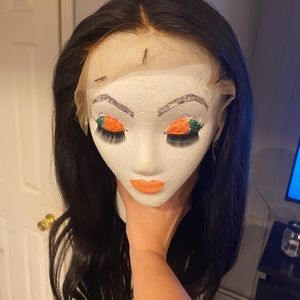 Brazilian straight 20” lace front wig.